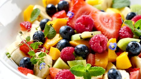 fresh fruit salad with berries, kiwi and mango