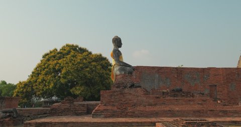 Footage of Buddha statue in Ayutthaya Historical Park at Ayutthaya,Thailand.