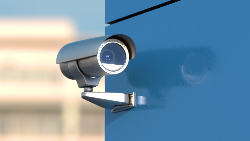 Security video camera at the corner of building moving and scanning street area | Shutterstock HD Video #1069939288