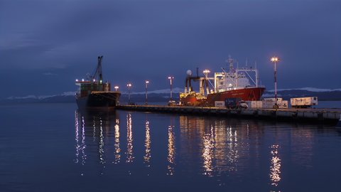 Ushuaia, Argentina - March 2020: Industrial Port of Ushuaia at Sunset, Tierra del Fuego Province, Argentina. 4K Resolution.
