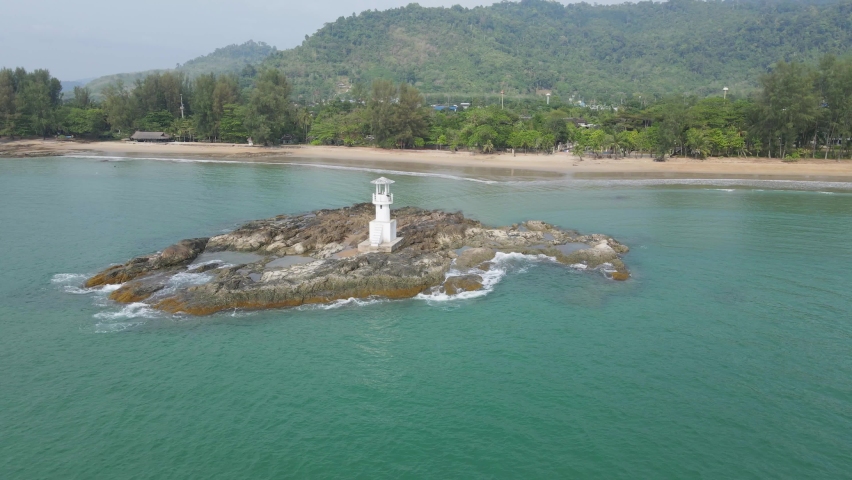 Ariel view with circle movement around the light house at Phang-Nga, Thailand.