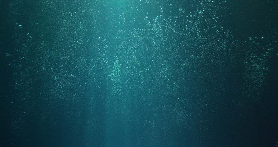 Sun beams and bubbles underwater | Shutterstock HD Video #1069970926