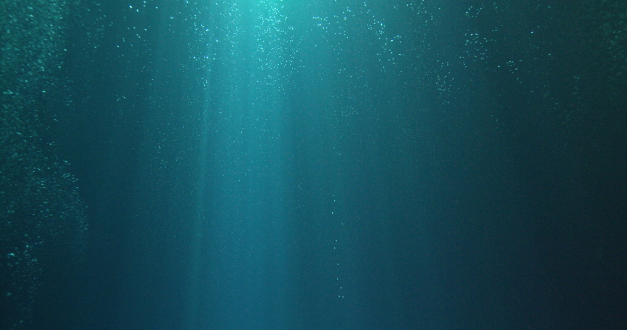 Sun beams and bubbles underwater | Shutterstock HD Video #1069970947