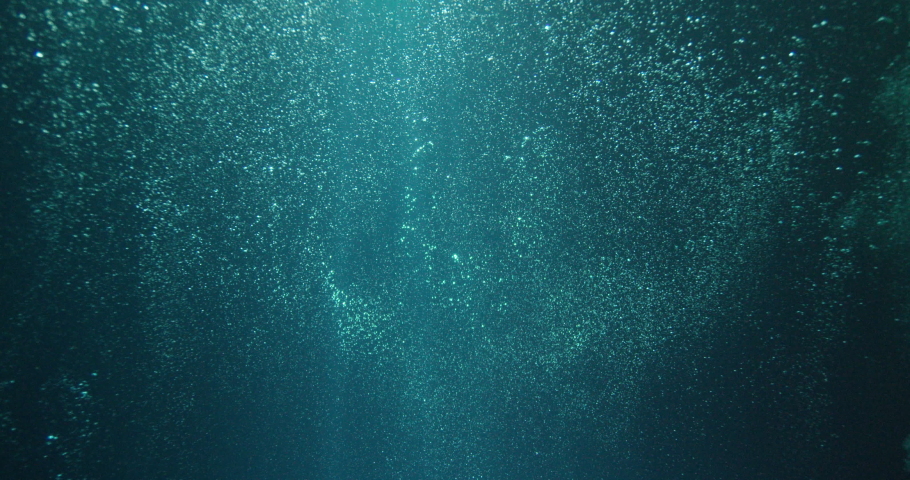 Sun beams and bubbles underwater | Shutterstock HD Video #1069970956