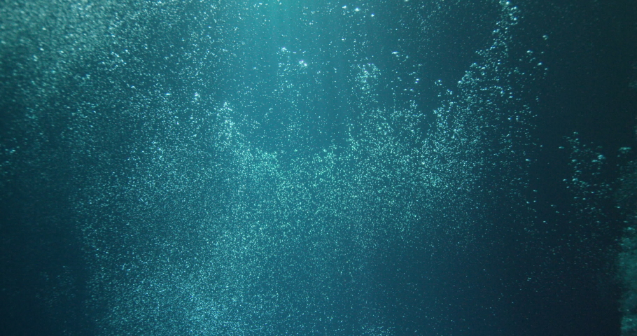 Sun beams and bubbles underwater | Shutterstock HD Video #1069970965