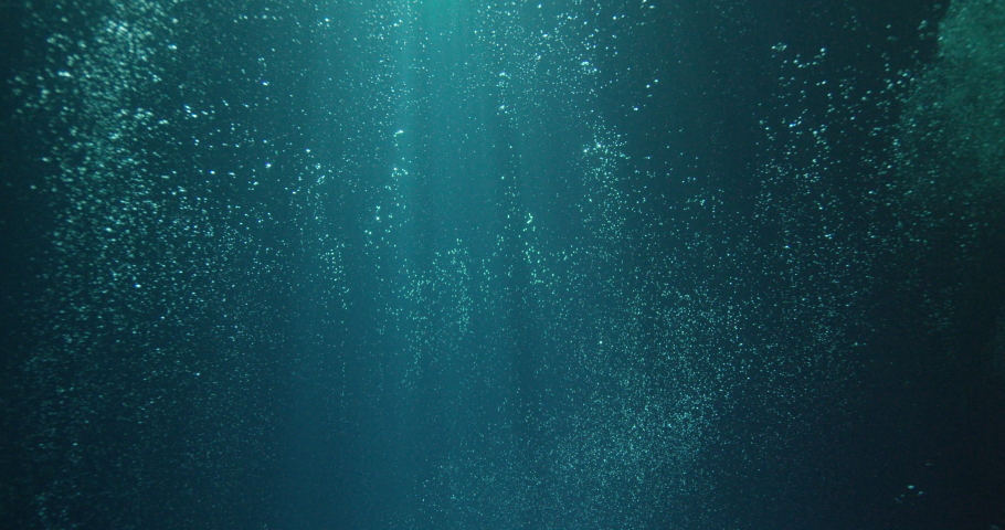 Sun beams and bubbles underwater | Shutterstock HD Video #1069970968