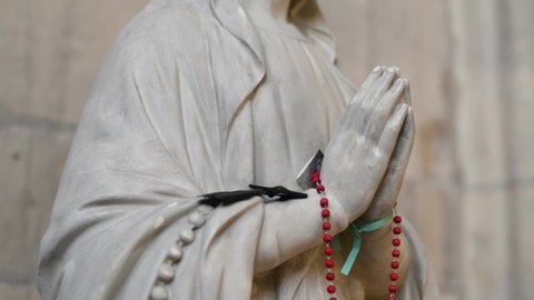 Statue of the praying virgin Mary Hands