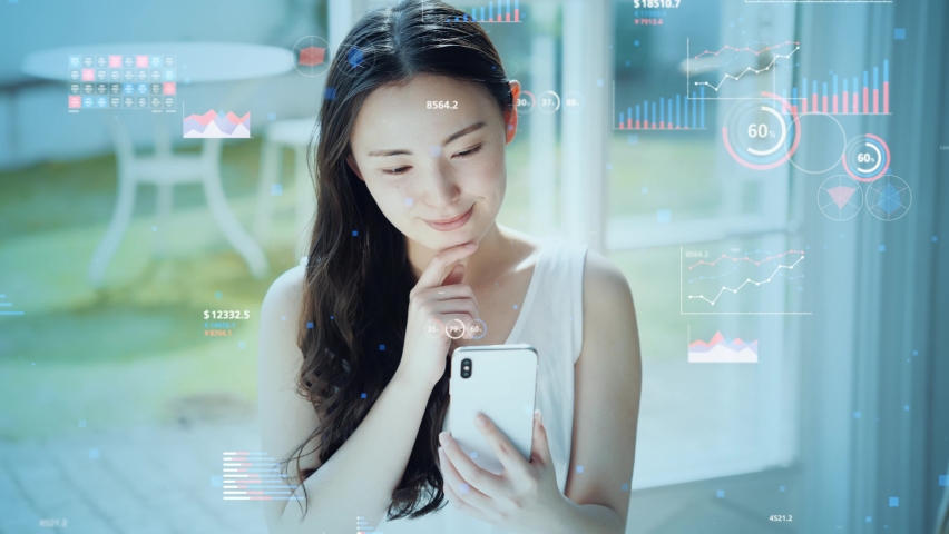 Mobile communication technology concept. Young asian woman using a smart phone. Business statistics. | Shutterstock HD Video #1069995712