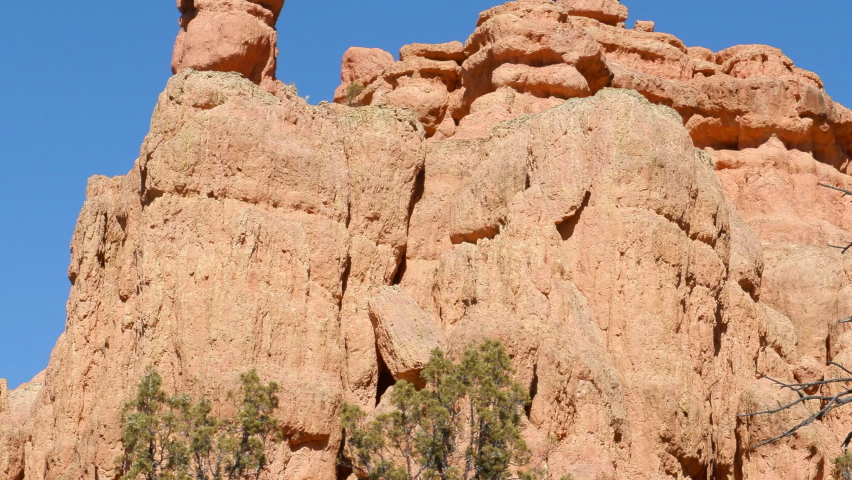 Establishing of red rock sandstone formations near the Red Canyon Visitors Center on Highway 12, gateway to Bryce Canyon National Park, Utah.  Shot in UHD on a sunny day.
