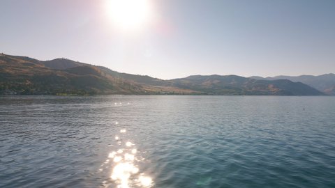 Sunny Summer Lake Background from Chelan in Eastern Washington. Amazing drone view of popular Pacific Northwest vacation destination