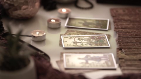 Moscow, Russia- January 2021: Blurred background of Tarot cards on table 