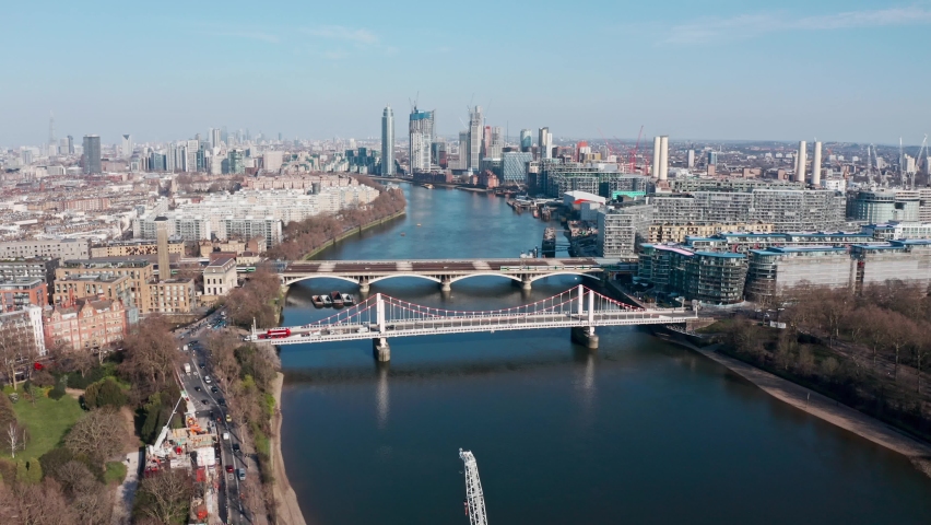 circling drone shot over London river thames at Battersea power station Chelsea Bridge Royalty-Free Stock Footage #1070007157