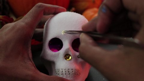 Making a sugar skull (calaverita de azúcar). Mexican traditions. Día de muertos (day of the dead). Handmade.