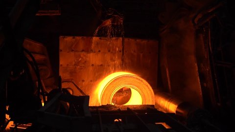 Red hot metal line. Production of rolled metal at a metallurgical factory