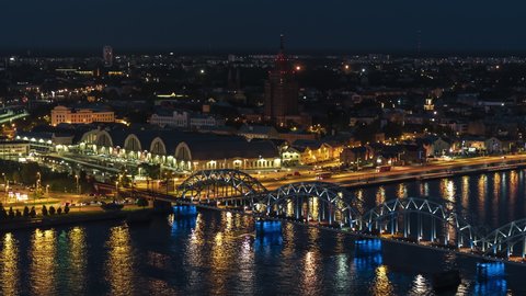 Establishing Aerial View Shot of Riga, Riga super wide skyline, Latvia at night evening