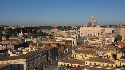 Aerial view of Saint Peter's Basilica in Vatican City within the city of Rome, Italy. Papal Basilica of Saint Peter in the Vatican, religious building and pilgrimage site seen from drone flying in sky