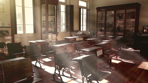 Vintage School Desks at an Empty Classroom in a Public School of Argentina during the Coronavirus Lockdown in Buenos Aires. Zoom In. 4K Resolution.