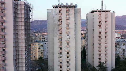 High-rise apartment buildings in a big city: residential skyscrapers, urban density and planning. Public housing project - flat complex in the form of a tower block in Podgorica, Montenegro, Europe. 