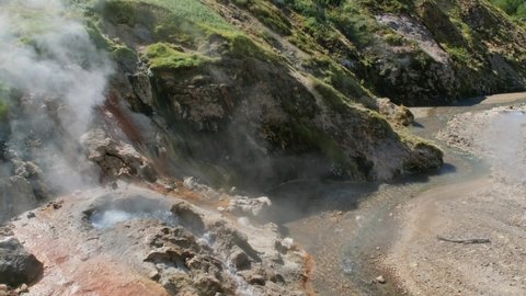Erupting geyser Bolshoy (Big) in the Valley of Geysers, Kamchatka peninsula, Russia, 4k
