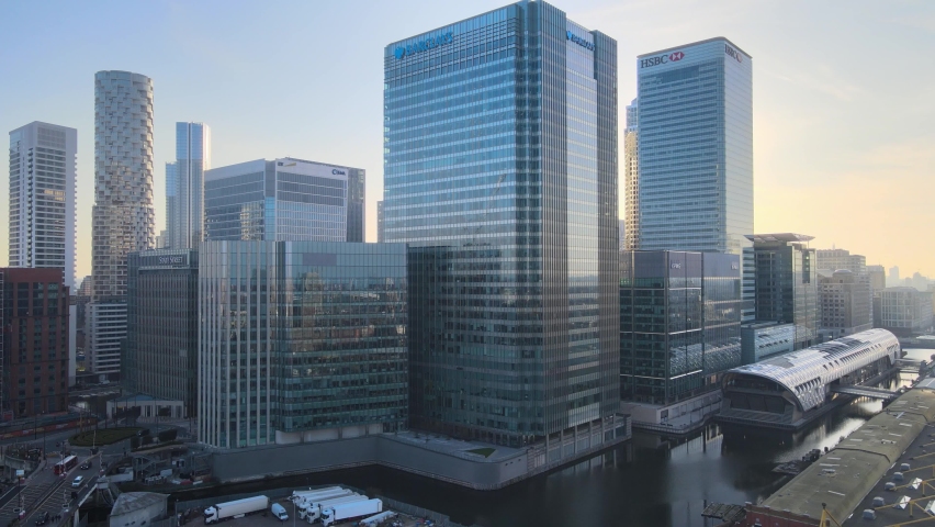 HSBC global headquarters in London's Docklands business district, Aerial Royalty-Free Stock Footage #1070028571