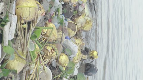 Environmental pollution problems: Water pollution. Plastic trash on the banks of the Mekong River. Cambodia. Asia