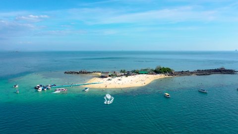 Aerial view of drone, Top view of Mini Island Turquoise Sea and White beach sand in summer day, Seawater clear and blue green. Nature in Khai Island. At Khai island, Phuket, Thailand.