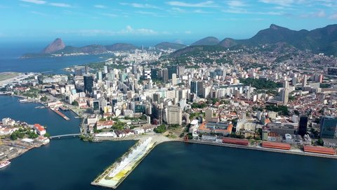 Downtown of Rio de Janeiro, Brazil. Panoramic view of bay of water, Rio de Janeiro, Brazil. Aerial landscape of coastal cityscape. Tropical travel. Summer travel. Cityscape scenery, Rio de Janeiro. 