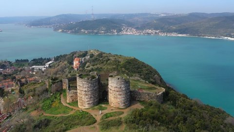 Yoros Castle and Joshua's Hill in Istanbul. Castle is now closed to visitors. Area is not supervised and visitors are free to walk, crossing a fence torn down along outer walls, walking along a path

