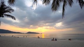 4K Nature video Phuket Thailand beach sea. Sunset at the beach in nature. Amazing cloud and sky background. Thailand tourism and travel concept.