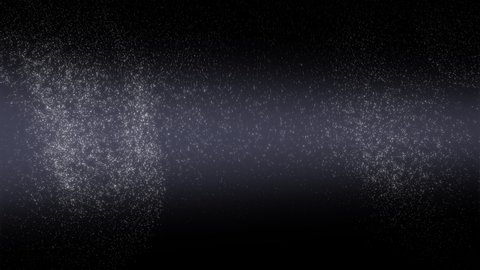 Natural organic dust particles floating on black background.
