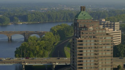 Traffic on bridge over river in Hartford city