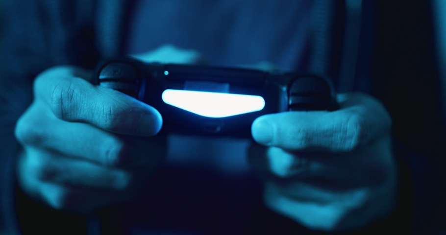 Using controller playing video games - close up of hands and joypad Royalty-Free Stock Footage #1070154703