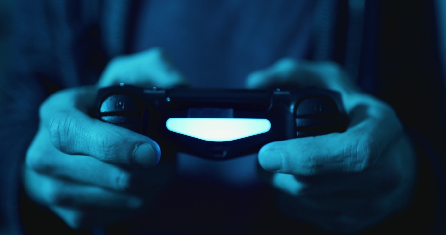 Using controller playing video games - close up of hands and joypad Royalty-Free Stock Footage #1070154703