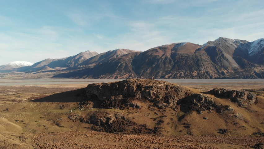 Mountains and Rangitata River valley in Canterbury, New Zealand.
Drone footage of popular tourist spot, Mount Sunday and surrounding area.