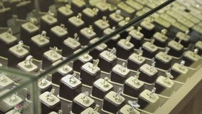 Rings gold jewelry on table . Jewelry tray of rows selling in a market .  - Powered by Shutterstock - Get 15% off with code: PIKWIZARD15