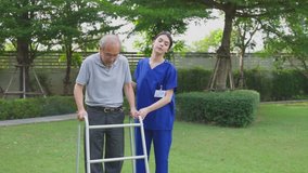 Asian young woman nurse at nursing home taking care disable senior elderly man. Caregiver doctor serve physical therapy for older patient to exercise and practice walking on walker or cane at backyard - Powered by Shutterstock - Get 15% off with code: PIKWIZARD15