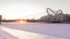 timelapse sunset day to night bridge city winter landscape traffic ice