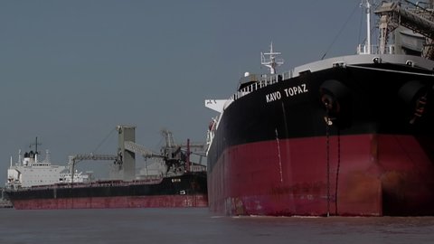 Rosario, Argentina - March 2020: Bulk Carriers in the Grain Port of Rosario, Parana River, Argentina.