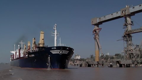 Rosario, Argentina - March 2020: Bulk Carrier in the Grain Port of Rosario, Parana River, Argentina.