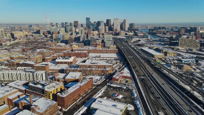 Boston aerial view from South Boston including Interstate Highway 93 northbound, Financial District and Back Bay in winter, Boston, Massachusetts MA, USA.  Royalty-Free Stock Footage #1070198779