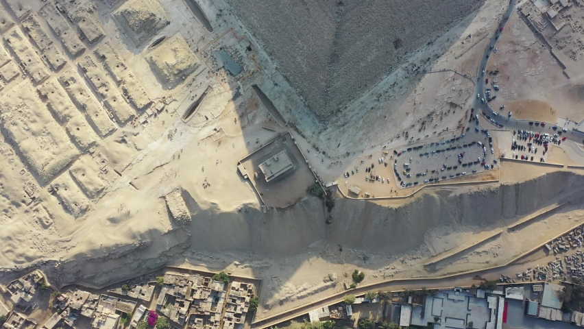 Cinematic Aerial downwards Drone shot of pyramids in Giza, Egypt Royalty-Free Stock Footage #1070201473
