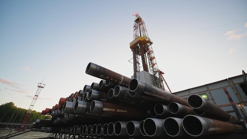 Onshore installation in the oil and gas industry. Oil drilling rig operation on the oil platform in the oil and gas industry. The top drive system of a drilling rig.  Royalty-Free Stock Footage #1070224024