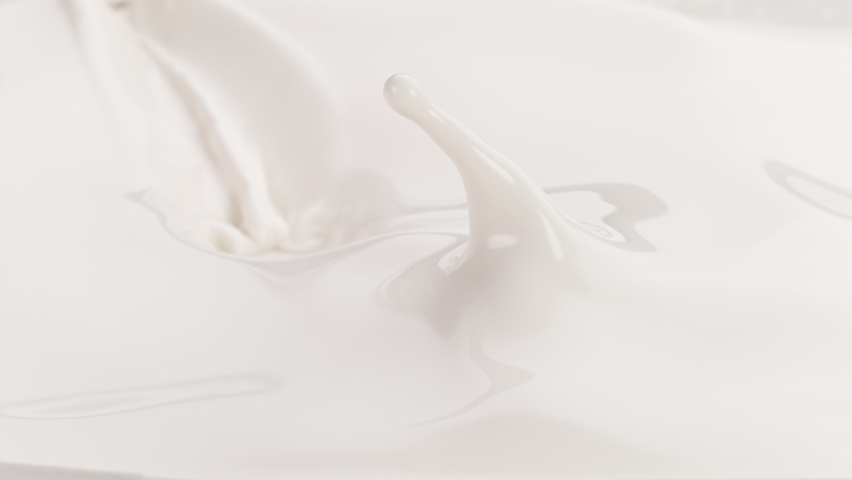 Super slow motion of milk cream. Royalty-Free Stock Footage #1070230945