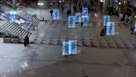 Scanning the crowd of people  walking at the railway station. Surveillance interface using artificial intelligence and facial recognition. Face Detection, CCTV, AI, Future, Total Control, Privacy.