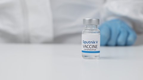 Sputnik V vaccine against Covid-19, coronavirus or SARS-Cov-2 in doctor hand in rubber gloves, March 2021, San Francisco, USA