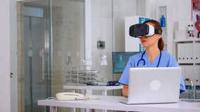 Medical nurse experiencing virtual reality using vr goggles in hospital office. Therapist using medical innovation equipment device glasses, future, medicine, physician, healthcare, virtual, simulator