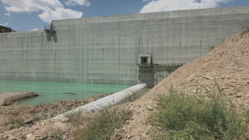 Dam construction work. Workers working in teams at the construction site. Earthmoving shed trucks. Construction worker. 20 June 2018 TURKEY