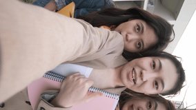 Group of Asian university students on video call. Selfie view. Vertical orientation footage - Powered by Shutterstock - Get 15% off with code: PIKWIZARD15