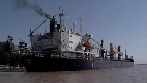 Rosario, Argentina - March 2020: Grain Bulk Carrier Docked in the Grain Port of Rosario, Parana River, Argentina.  