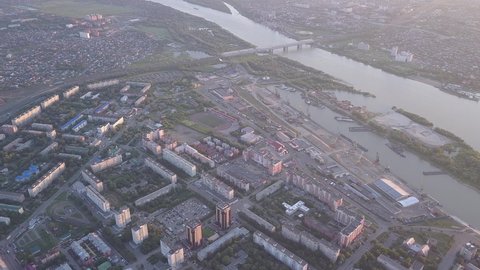 D-Cinelike. View of the city of Omsk and Irtysh river during sunset. Russia, Aerial View